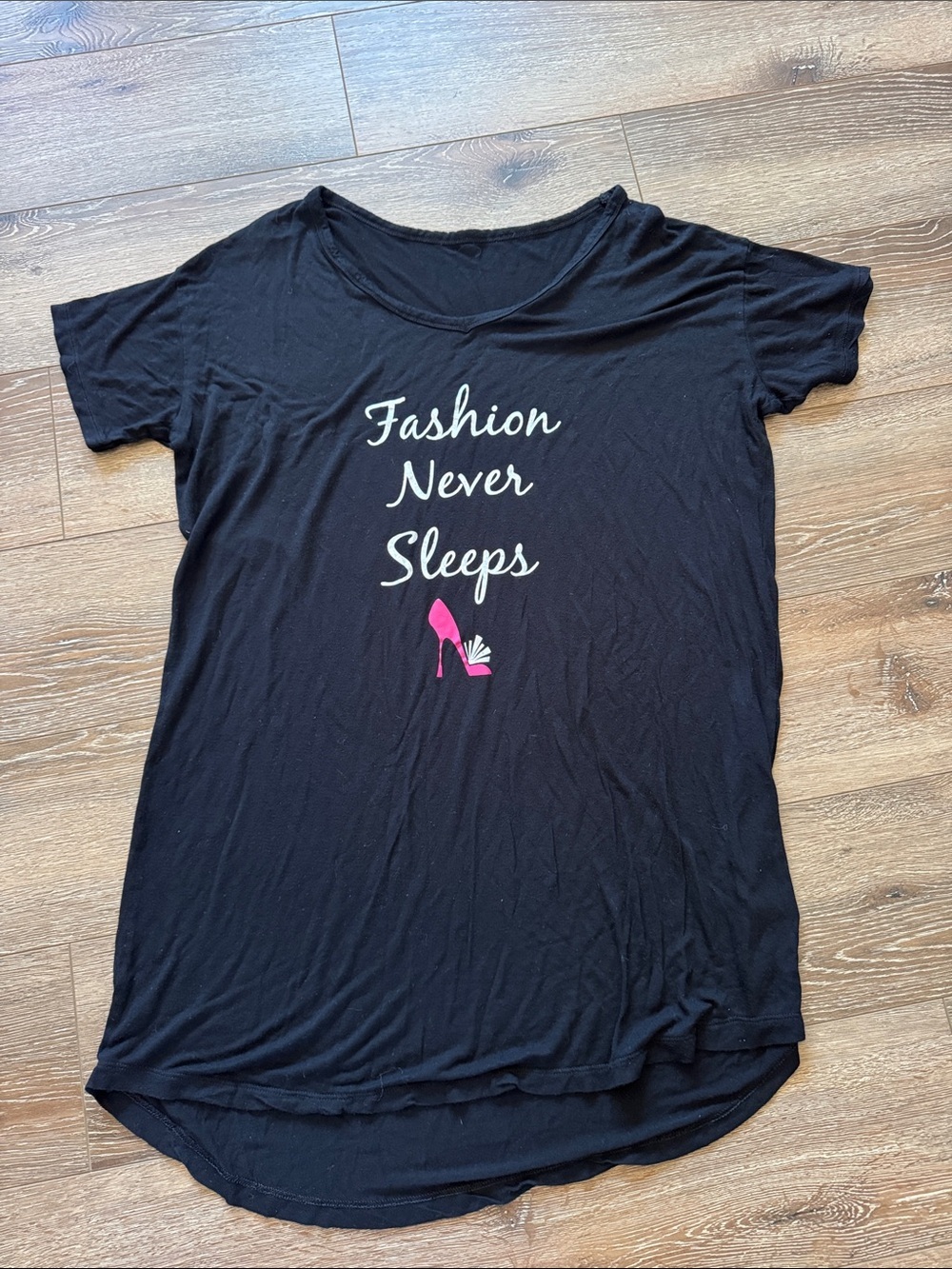Black Tee with "Fashion Never Sleeps" and Pink Heel Graphic Size: Medium